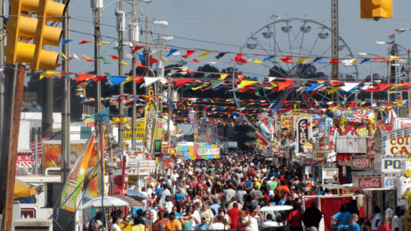 a large crowd of people at a carnival