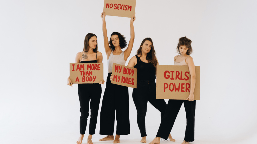 people holding up signs