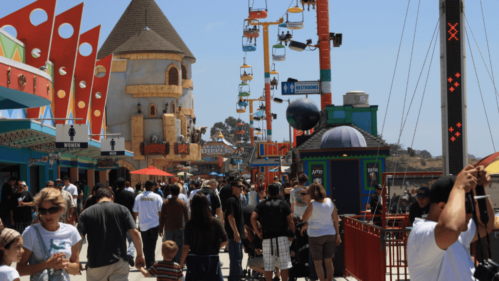 a large crowd of people at a carnival